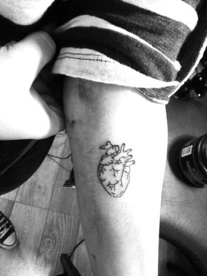 Heart tattoo. Lineal black heart tattoo.