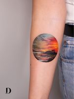 Beautiful tattoo by Deborah Genchi #DeborahGenchi #debartist #realism #realistic #illustrative #watercolor #color #sunset #beach #landscape #sky #forearm #arm #clouds
