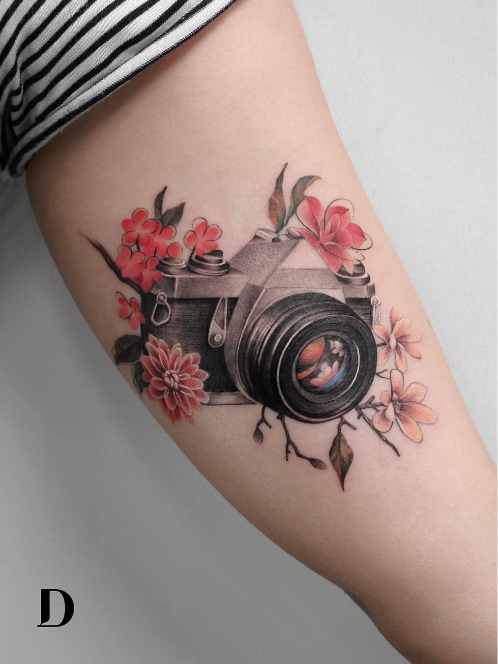 Tattoo uploaded by Deborah Genchi • Beautiful tattoo by Deborah Genchi  #DeborahGenchi #debartist #realism #realistic #illustrative #watercolor  #color #camera #flowers #floral #35mm #analogfilm #upperarm #arm • Tattoodo