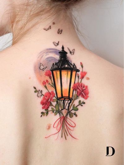 Beautiful tattoo by Deborah Genchi #DeborahGenchi #debartist #realism #realistic #illustrative #watercolor #color #lantern #candle #rose #flower #floral #butterfly #back #Upperback