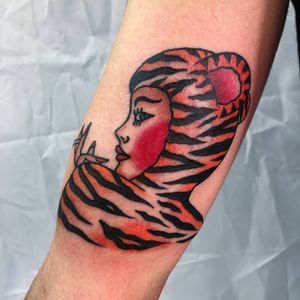 Arm tattoo by Paul Colli #PaulColli #arm #upperarm #ladyhead #lady #tigerlady #tiger #cat #cigarette #pinup #color #traditional  #tattoodo #tattoodoapp #tattoodoappartists #besttattoos #awesometattoos #cooltattoos