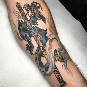 Dragon riding that opium pipe high, by @squiretattooer 