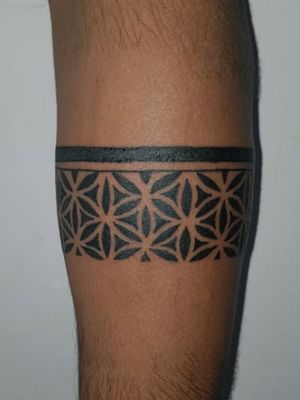 Hand band tattoo