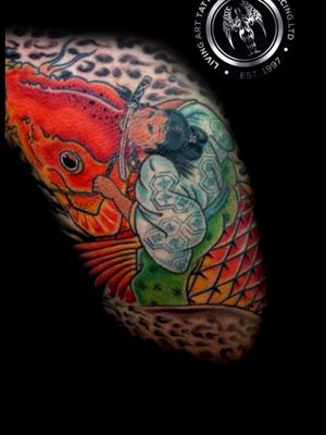  This Koi fish and geisha girl were done on a good friend that loves the Japanese style of tattoos as much as me and this was one of the first of many Japanese style tattoos we did on him.Thank you and I will always be grateful and honored that you carry my art.