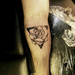 Rose tattoo. Black geometric flower tattoo with pointillism. Puntillismo. Black work.