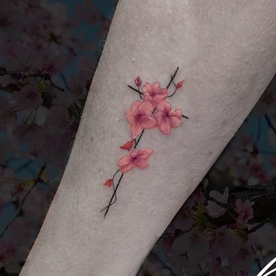 Instagram: @rusty_hst Custom flower piece #fineline #flowers #cross #cherryblossoms #smalltattoo #microtattoo #color #custom