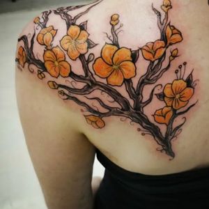 Orange cherry blossoms i did for a client.  #cherryblossomtattoo #cherryblossom #floraltattoo #flowertattoo #girlswithtattoos #girlswithink 