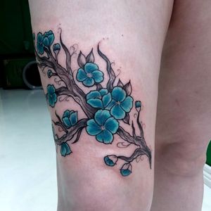 Blue cherry blossoms i did to match existing orange ones i did prior.  #cherryblossomtattoo #cherryblossom #floraltattoo #flowertattoo #girlswithtattoos #girlswithink #jonboytattoos 
