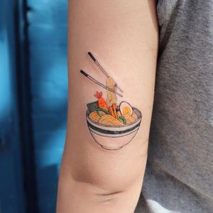 Ramen noodles tattoo by Hannah Kang #HannahKang #ramentattoos #ramennoodles #noodletattoo #foodtattoo #ramen #Japanese #chopsticks #eggs #illustrative #small #upperarm #arm