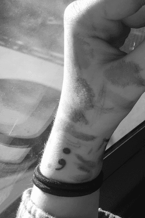 My first tattoo, a semicolon on my wrist I got matching with my mum on my 16th birthday. ~ Ignore the paint. ~ 