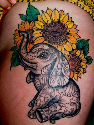 My two favorite things💕 #babyelephant #sunflowers #mandala #adorable