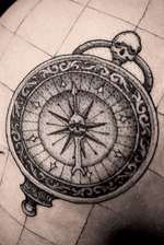 Skull compass with some details. Fresh tattoo, pores are still very visible.
