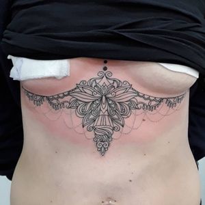 Underboob tattoo