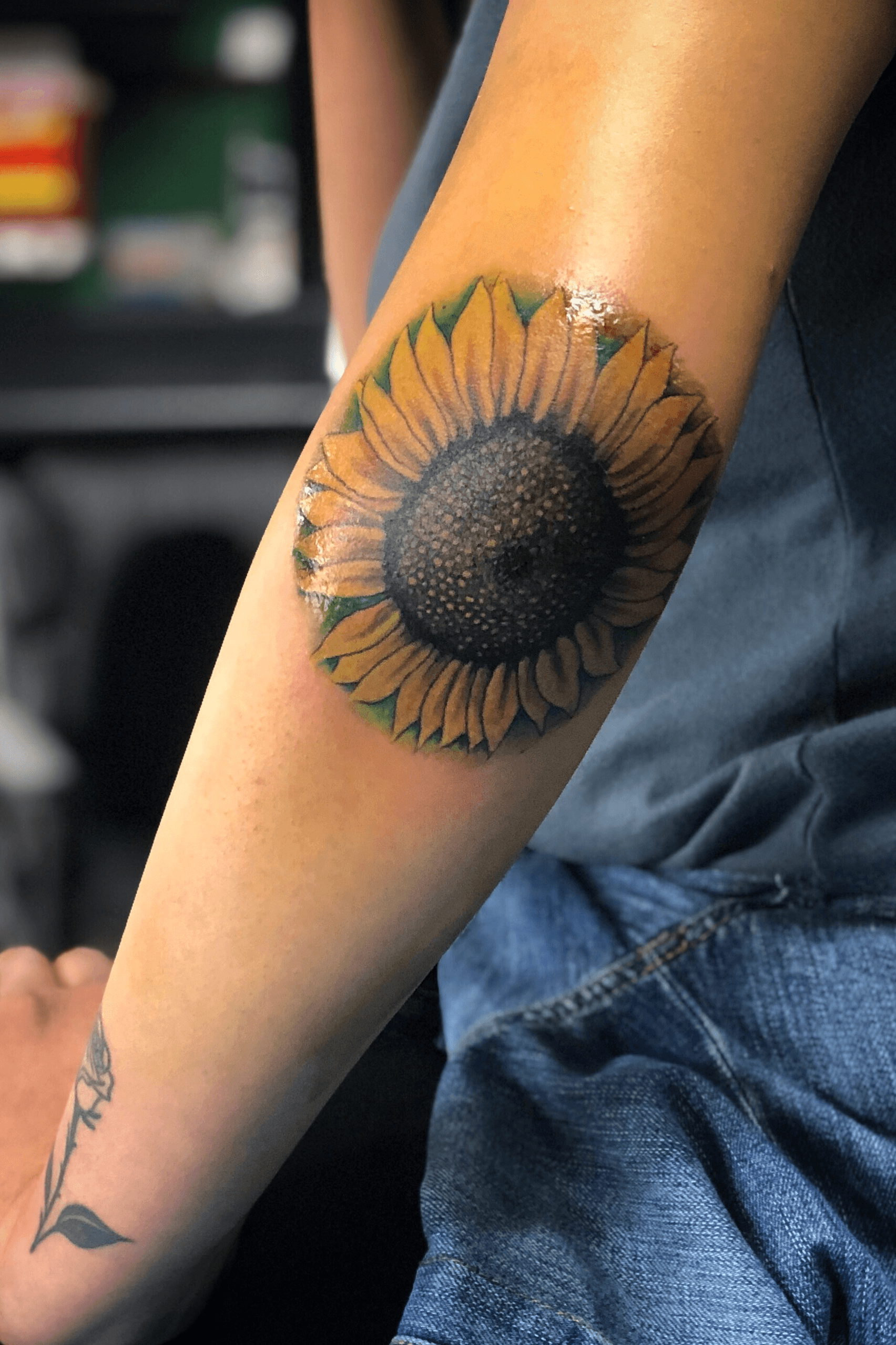 Sunflower elbow piece  Elbow tattoos Red tattoos Sunflower tattoo sleeve