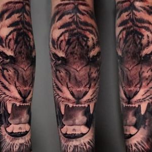 The roar of the tiger sleeve tattoo in black and grey realism, London, UK | #tigertattoos #blackandgrey #realism