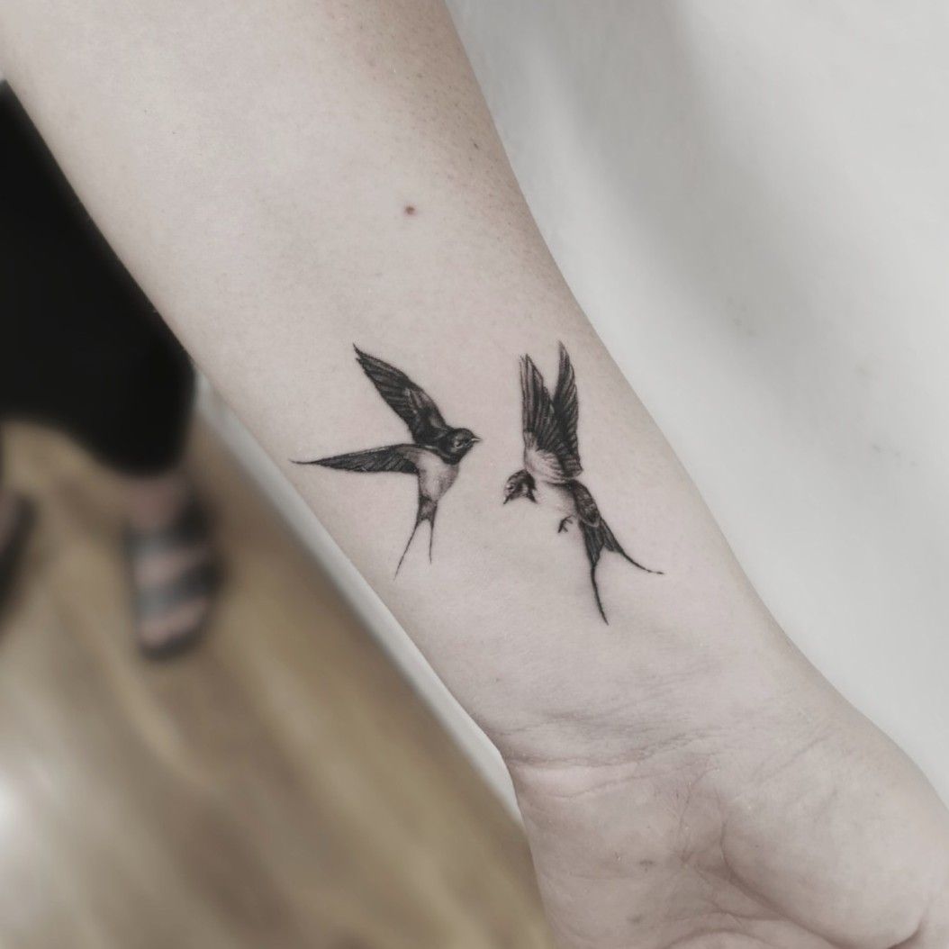 swallow tattoos on wrist