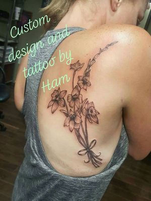 Tattoo by Amber "Ham" Cantu#customtattoo #blackandgrey #floral #gladiolus