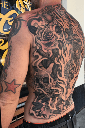 Back tats #backpiece #blackandgrey #roses #skulls #snake #flames 