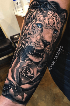 Jaguar head and Rose Combo. Done by Jae at Tsunami Tattoo in Tacoma, Washington. For more info. Add me at @jae_tattoos in Instagram. 