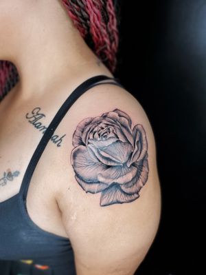 Realistic rose done by Domo Julliano out of St Louis, Mo