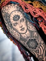 Eye tattoo by Aries Rhysing #AriesRhysing #eyetattoos #eyetattoo #eye #arm #portrait #pattern #buddhist #thirdeye #sacredgeometry #blackandgrey #illustrative #ornamental #dotwork #flower