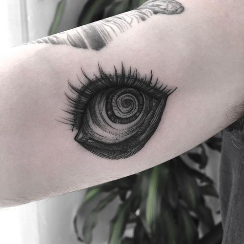 Eye tattoo by Marlon M Toney #MarlonMToney #eyetattoos #eyetattoo #eye #illustrative #blackwork #linework #anime #manga #junjiito #spiral #arm