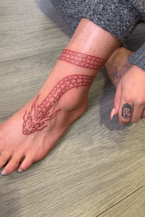 Tattoo by Thirteen tattoo and body piercing 