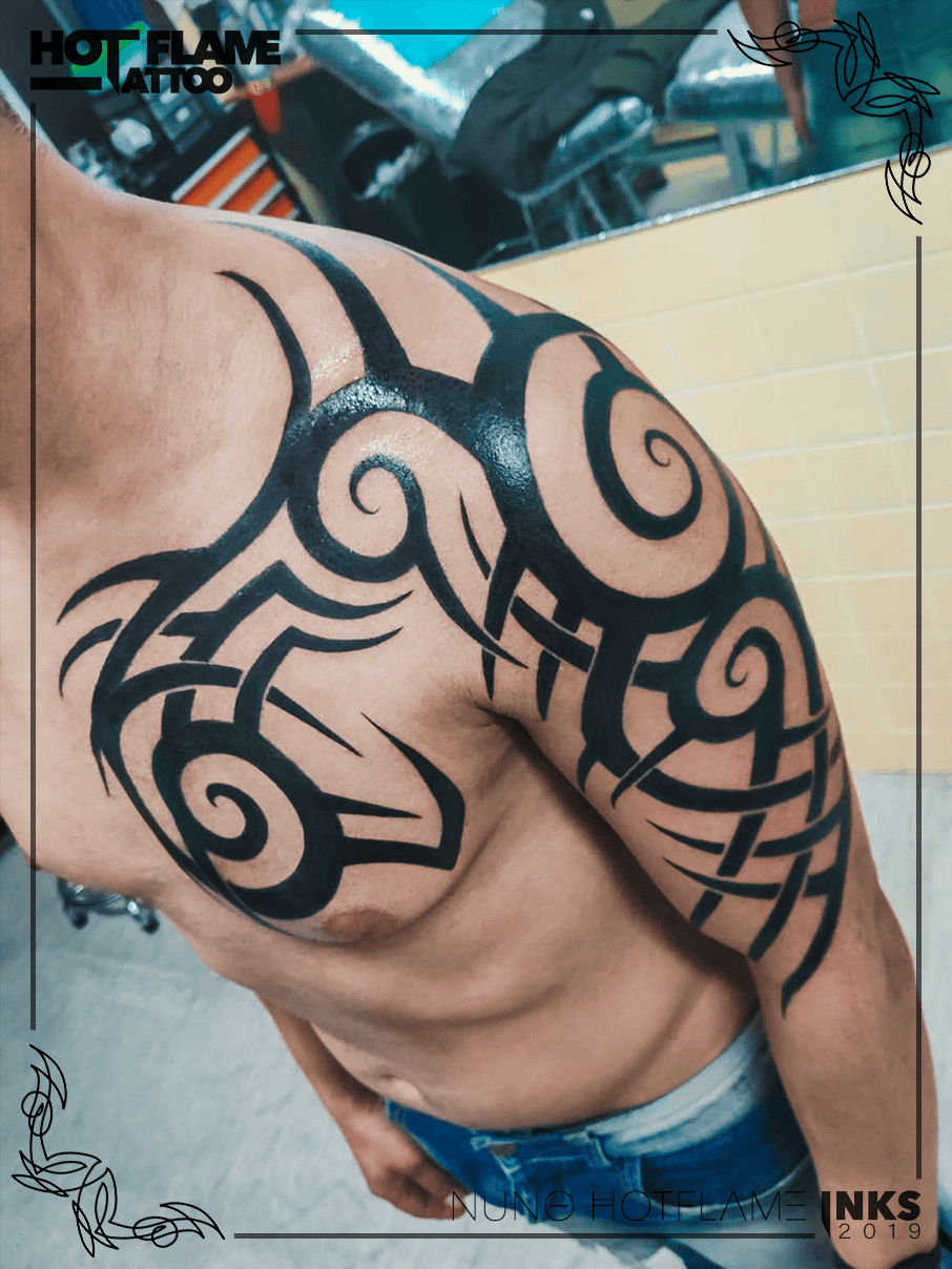 Tribal Flame Over Brand tattoo