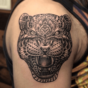 Geometric leopard tattoo