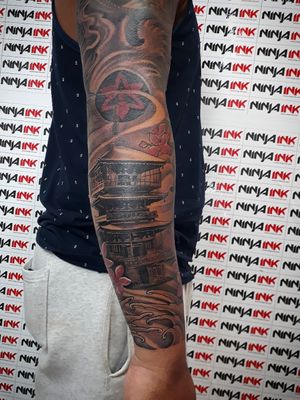 sharingan arm tattoo