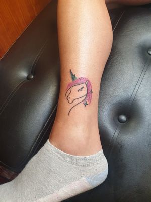 Simple Unicorn design for a valued customer. #tattoo #unicorntattoo #unicorn #colour #colourtattoo #linework #pink #ankletattoo #animals #ankmaltattoo #smalltattoo #SimpleAndBeautifulTattoo #Simple #lines 