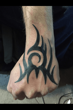 Tattoo uploaded by Family Circle Tattoo • Tribal on top of hand • Tattoodo