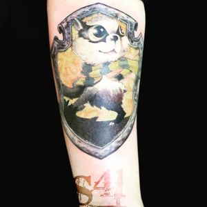 Custom hufflepuff badger forearm tattoo 