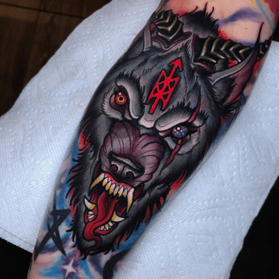 Covered some old tattoos with this Odin inspired wolf