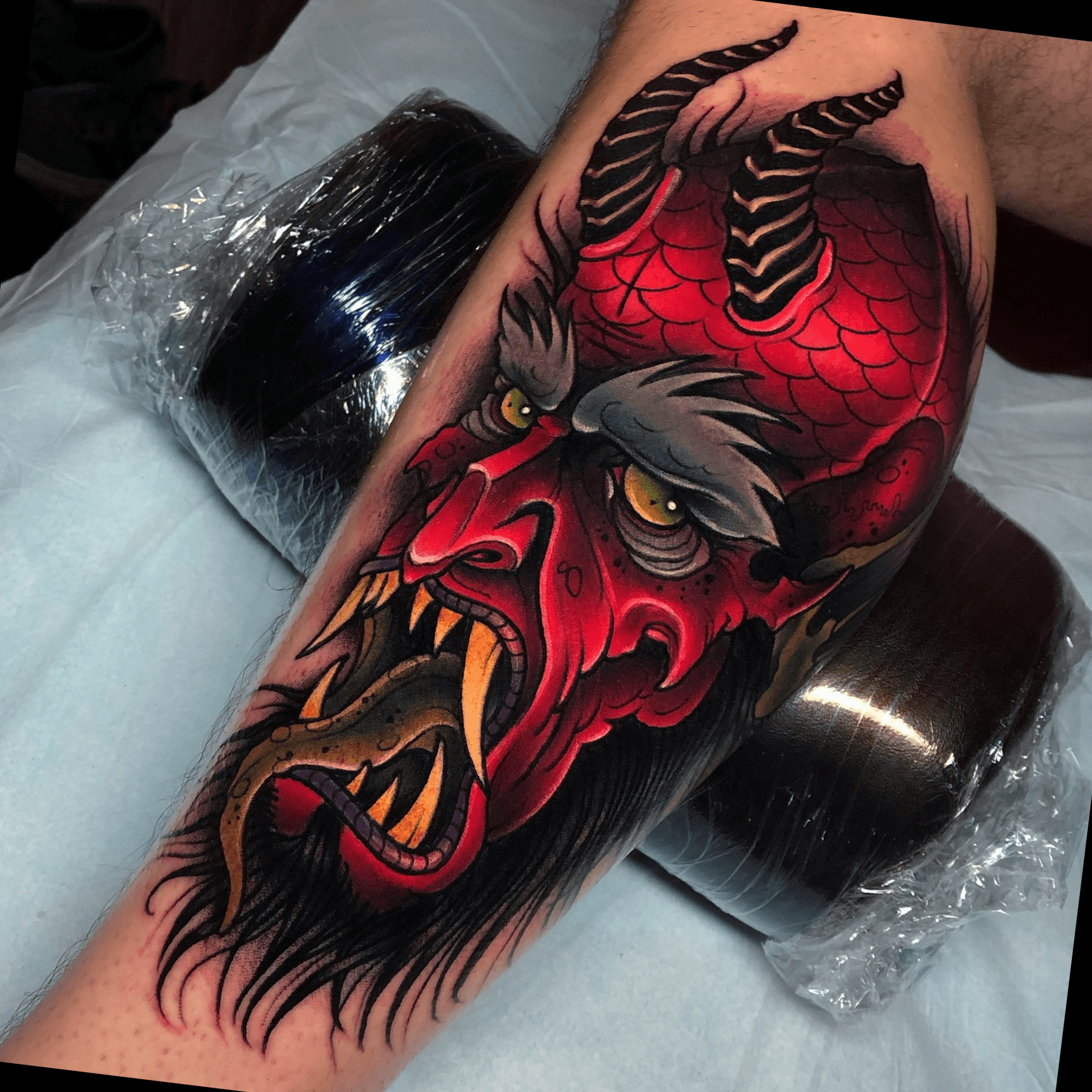 Demon holding hourglass tattoo by Ick Abrams of GRIM Tattoo in Penndel PA   rtattoos