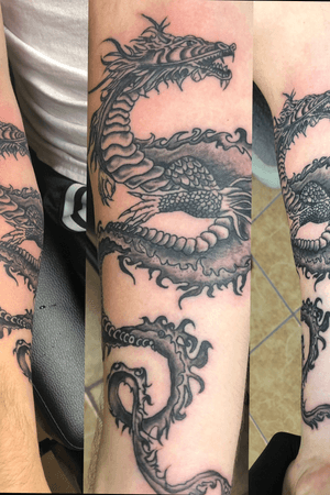 Custom dragon i didnt draw. My client brought me a drawing someone did for him and i redrew it, making it tattooable and this is the outcome.