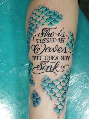 Mermaid tattoo with script work