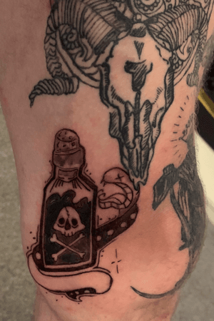 The poison and snake, something i drew and myslef from a mixture a pictures and tattooed it on my left leg. I wouldn’t recommend getting a tattoo here it hurts like crazy !! 