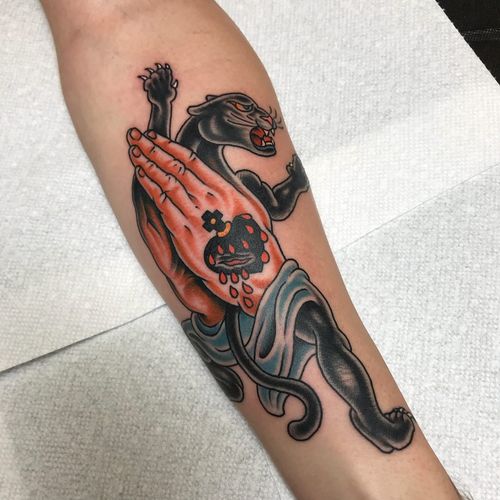 Clapper tattoo by Josh Snyder #JoshSnyder #arm #panther #sacredheart #cross #cat #blood #traditional #color #clappertattoo #clappers #prayer #hands #religious #jesus #mary #iconic