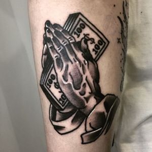 Clapper tattoo by Moogy #Moogy #traditional #money #100 #dollar #blackwork #arm #clappertattoo #clappers #prayer #hands #religious #jesus #mary #iconic