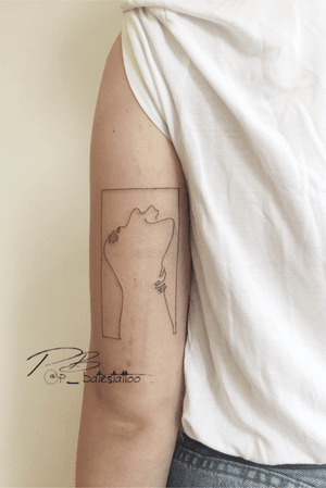 Embrace the intricate beauty of this fine line illustrative tattoo on the upper arm by Patrick Bates.