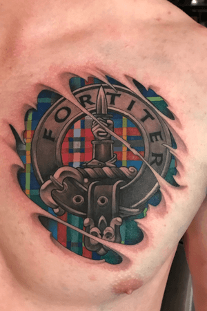 Coat of arms and family tartan. 