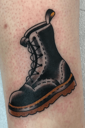Tiny Doc Marten Boot on inside of ankle 