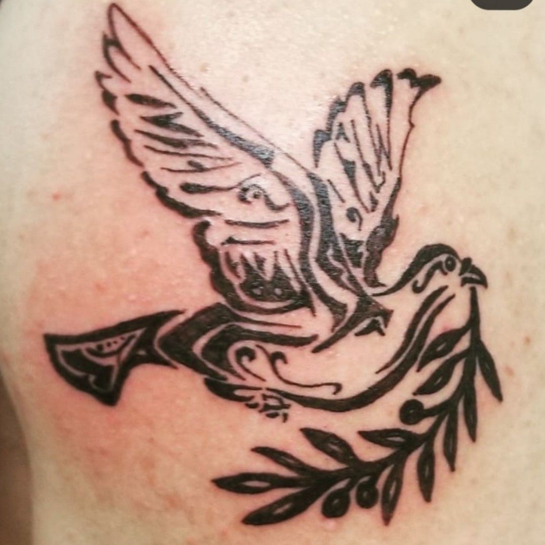 Initials Hidden in a Tattoo, Revealed