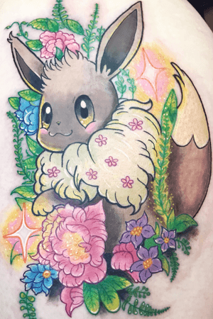 A fun eevee thigh piece! #pokemon #eevee #newschool #cute #kawaii #flowers #anime #glitter