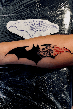 Batman wings tattoo