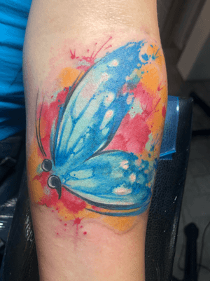 Did this guest spotting in Longmont, Colorado at Sharkeys Paradise. Watercolor butterfly with cleft note as the body