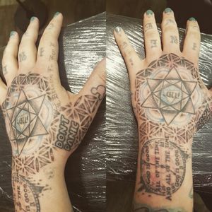 Starting to add sacred geometric dot work to a hand piece 