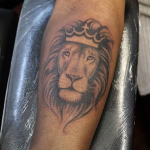 Lion face on the arm