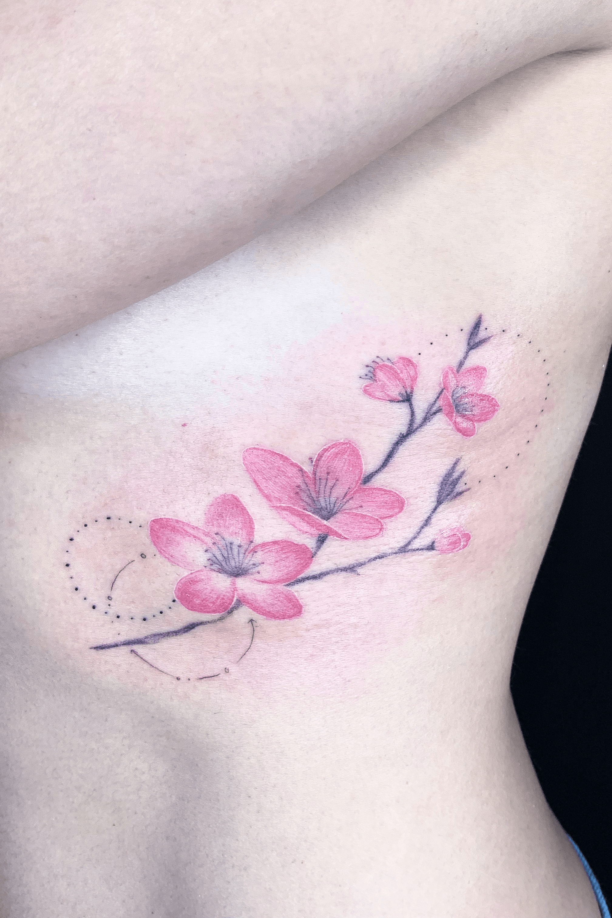 Tattoo uploaded by Yink Tattoos  Cherry blossoms on the ribs  Tattoodo